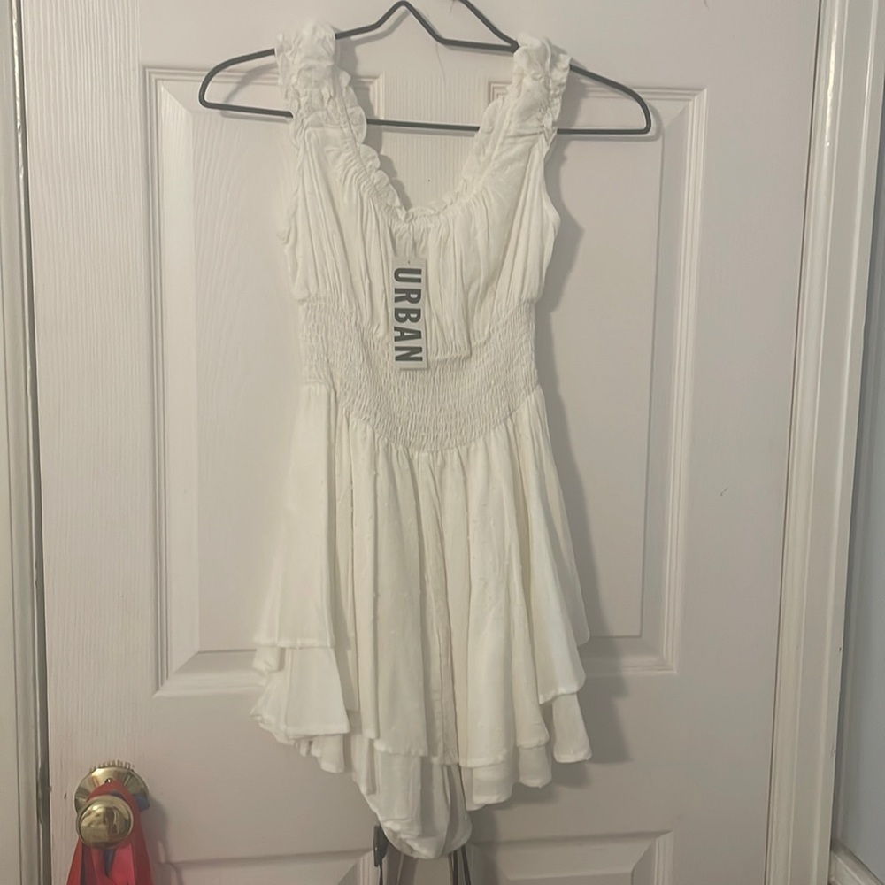 White urban outfitters romper , brand new with tags . it’s so adorable!